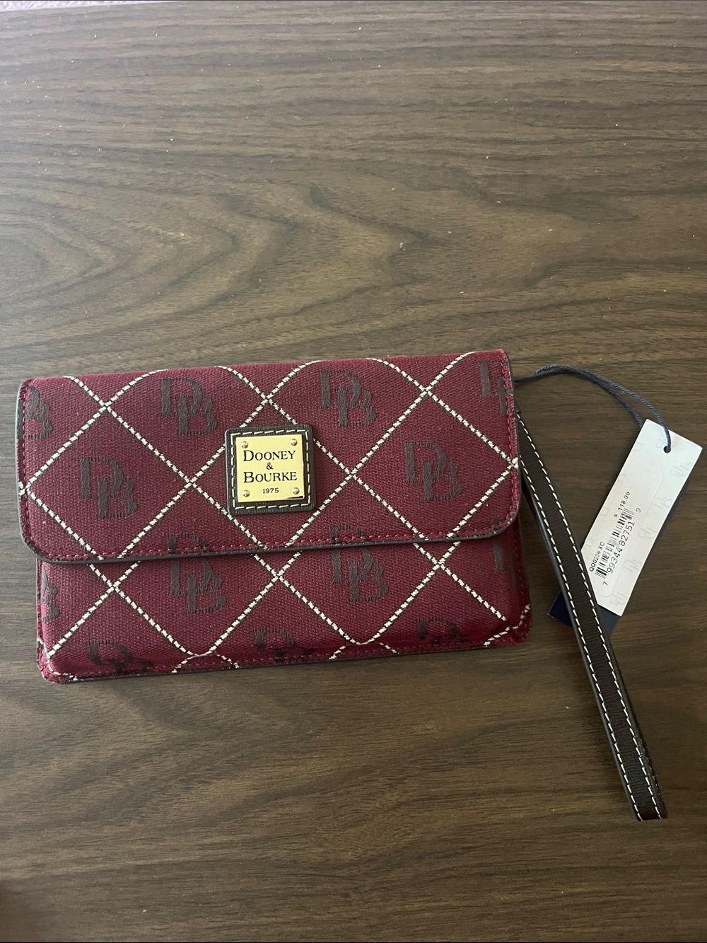 Dooney & Bourke Burgundy Quilted Logo Wristlet with Gold Plaque